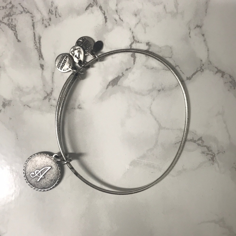 ‘A’ Alex and Ani bracelet, worn.